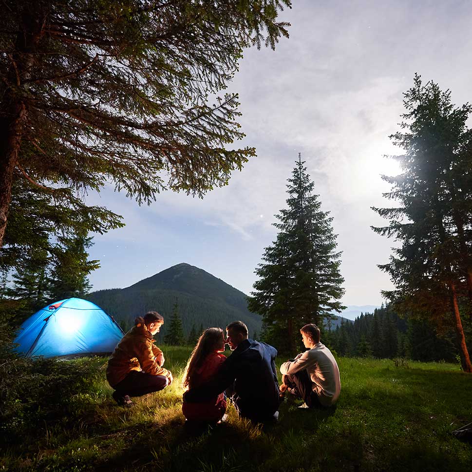 Campers enjoying tent rental experience in Kananaskis, Alberta